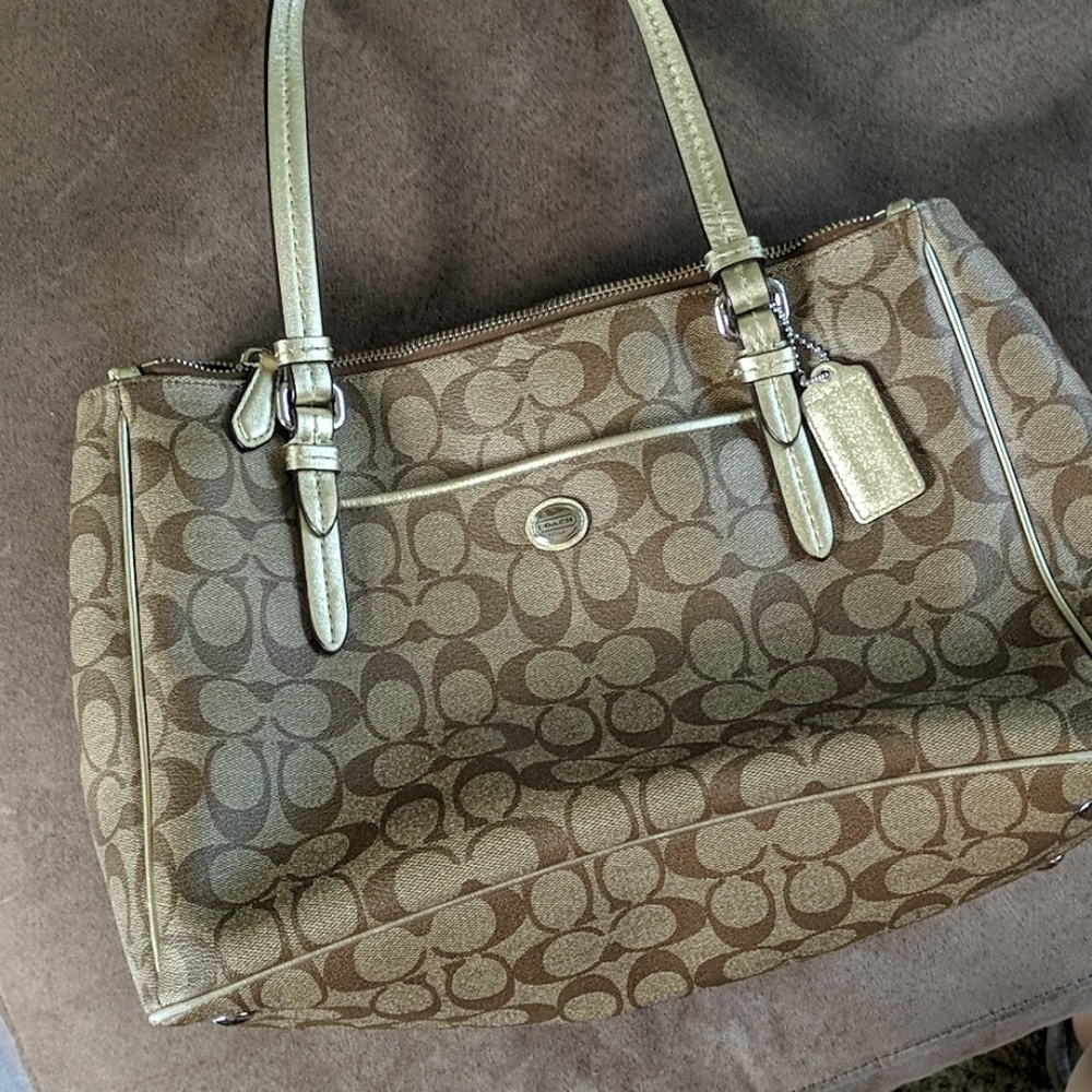 Large tan and gold Coach logo tote